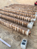 Rows of the first Territh concrete block prototype under construction